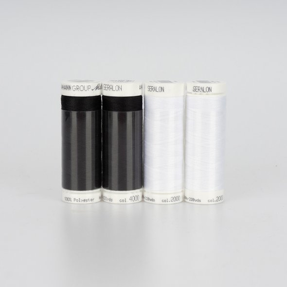 Amann Mettler Seralon No.100/ 200 m Garnset (2 x schwarz/ 2 x weiß)